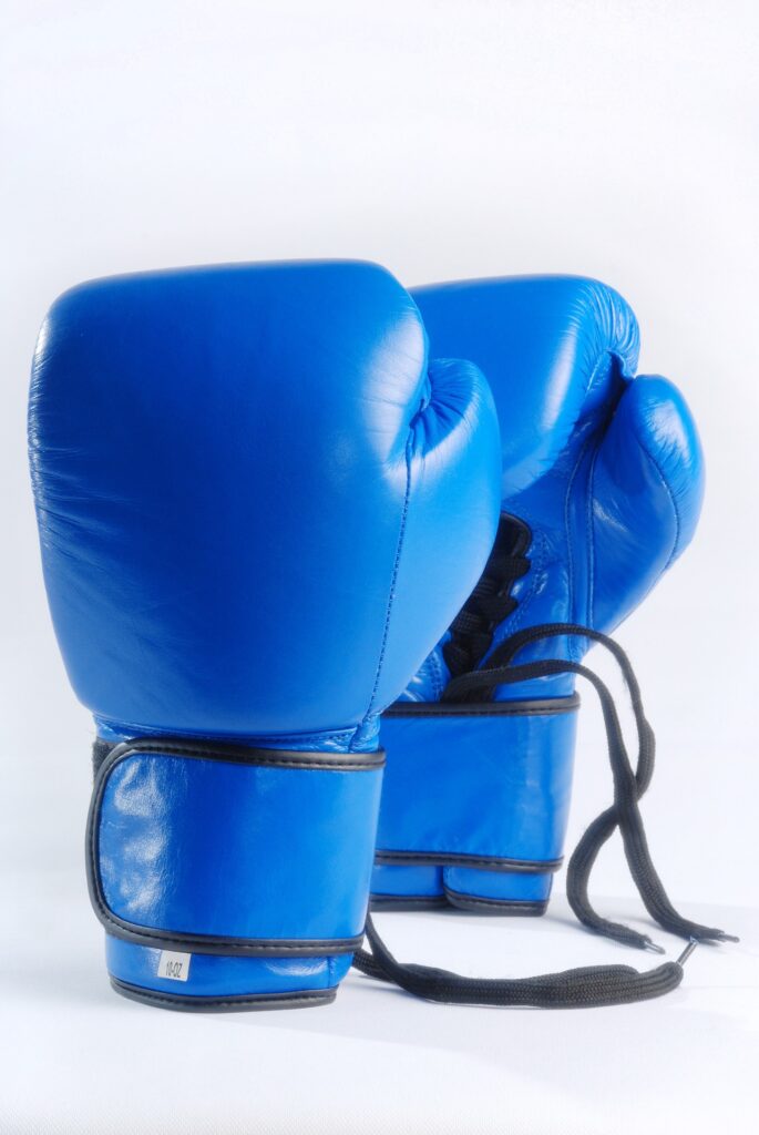 A pair of blue boxing gloves.