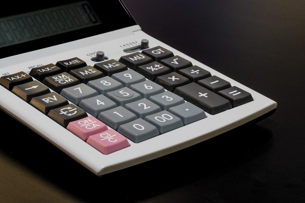 A calculator on a table.