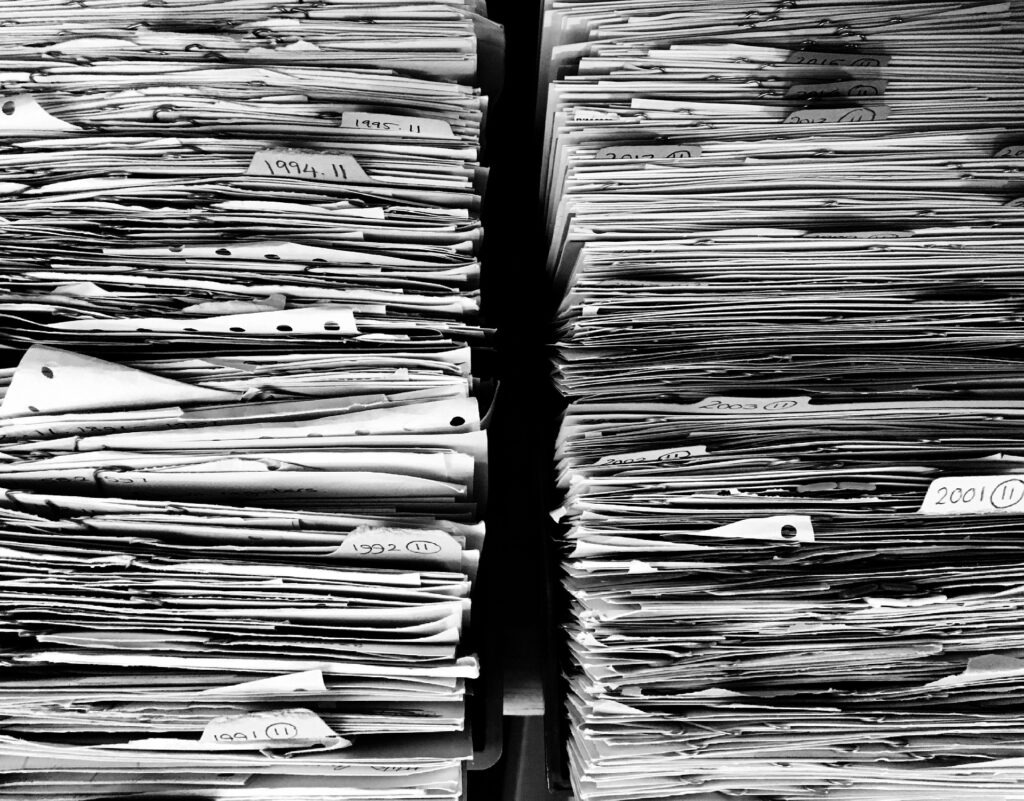 A stack of files and papers.
