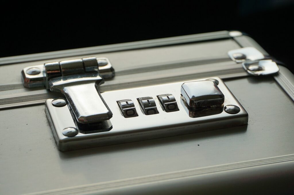 A combination lock on a briefcase.